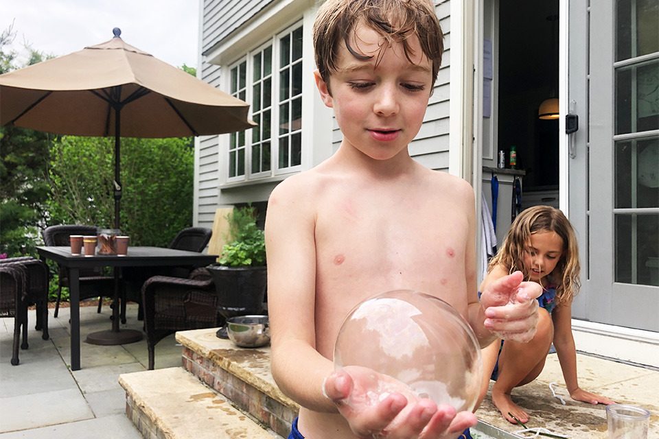 Fun & Messy Backyard Science Experiments for Kids This Summer Make bubbles strong enough to catch and bounce in with fun science experiments for kids.