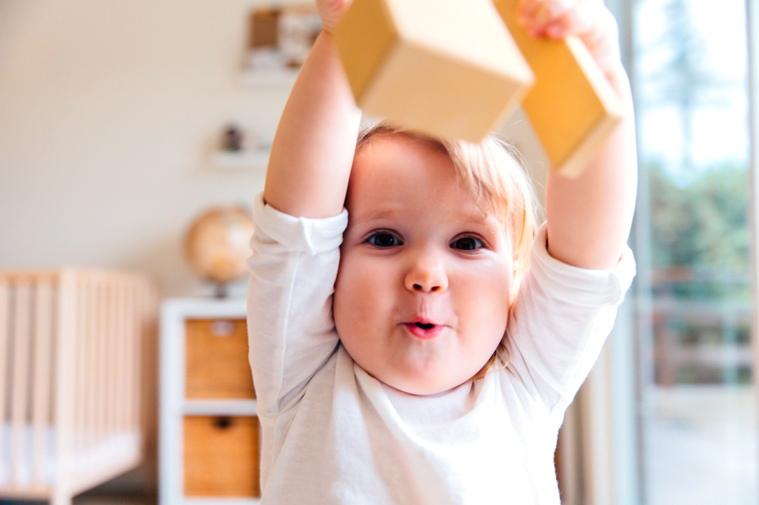 Walking, talking, grabbing, holding, smiling, laughing... it's all coming. But when? Photo by Tatiana Syrikova, via Pexels